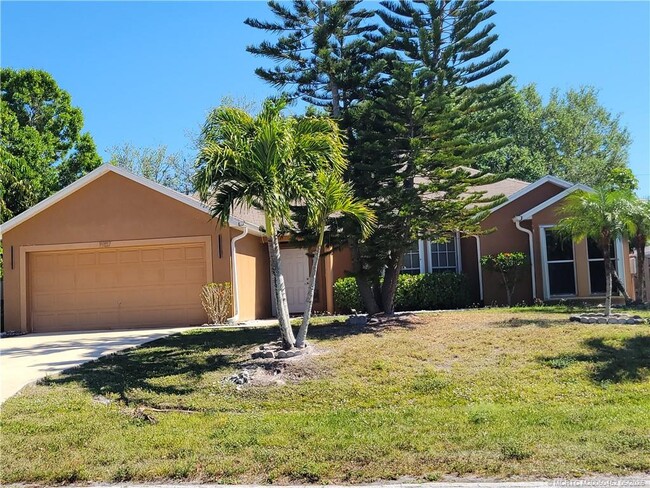 property at 1957 SE Sandia Dr