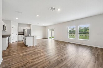 7727 Peace Lily Ave in Wesley Chapel, FL - Building Photo - Building Photo