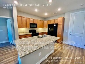 14301 E Tennessee Ave in Aurora, CO - Building Photo - Building Photo