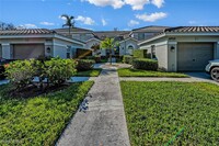 6910 Satinleaf Rd N in Naples, FL - Foto de edificio - Building Photo