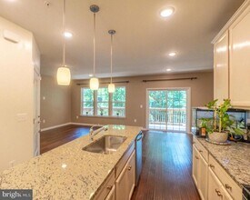 13933 Hollow Wind Way in Woodbridge, VA - Building Photo - Building Photo