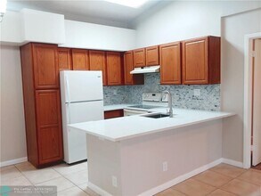 921 Lyons Rd-Unit -3206 in Coconut Creek, FL - Building Photo - Building Photo