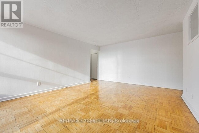 property at 165 Cosburn Ave.