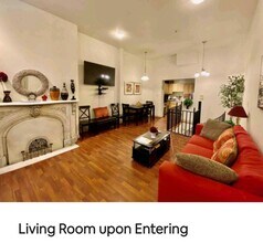 927 N Calvert St, Unit 1F in Baltimore, MD - Foto de edificio - Building Photo