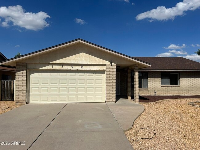 property at 1302 W 13th St