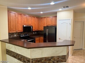 8585 Athena Ct in Lehigh Acres, FL - Building Photo - Building Photo