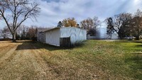 307 Dove St NE in Minnesota Lake, MN - Foto de edificio - Building Photo