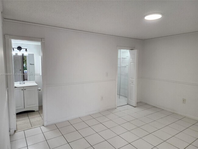 property at 10879 NW 7th St