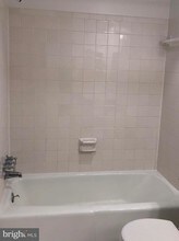 7680 Tremayne Pl-Unit -109 in McLean, VA - Foto de edificio - Building Photo