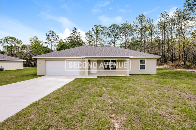property at 825 Marion Oaks Manor