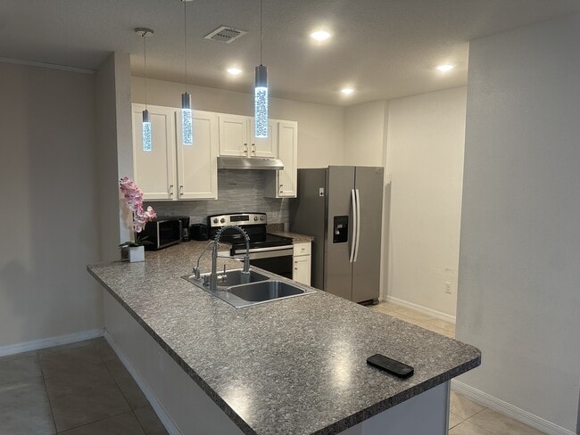 9006 Pinales Wy in Kissimmee, FL - Building Photo - Building Photo