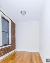 Perry Street in New York, NY - Building Photo - Building Photo