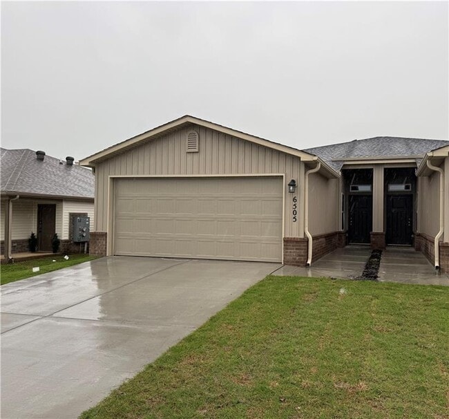 property at 6505 NW Vandergriff St