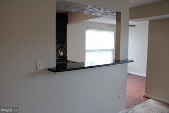 7927 Mandan Rd-Unit -204 in Greenbelt, MD - Building Photo - Building Photo