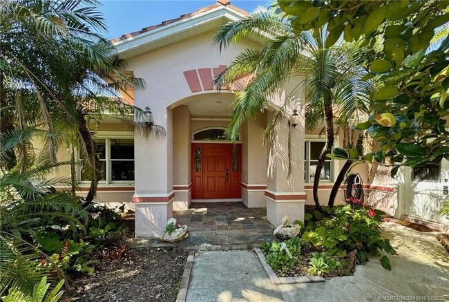 property at 4881 SW Lake Grove Cir