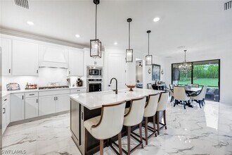 6770 Pennyroyal Dr in Naples, FL - Building Photo - Building Photo