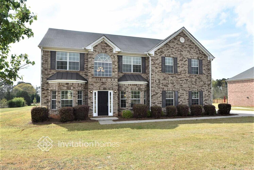 65 Muirfield Dr in Covington, GA - Building Photo