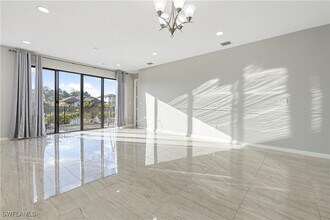 8976 Madrid Cir in Naples, FL - Building Photo - Building Photo