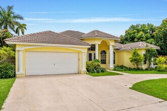 103 Black Olive Crescent in Royal Palm Beach, FL - Building Photo - Building Photo