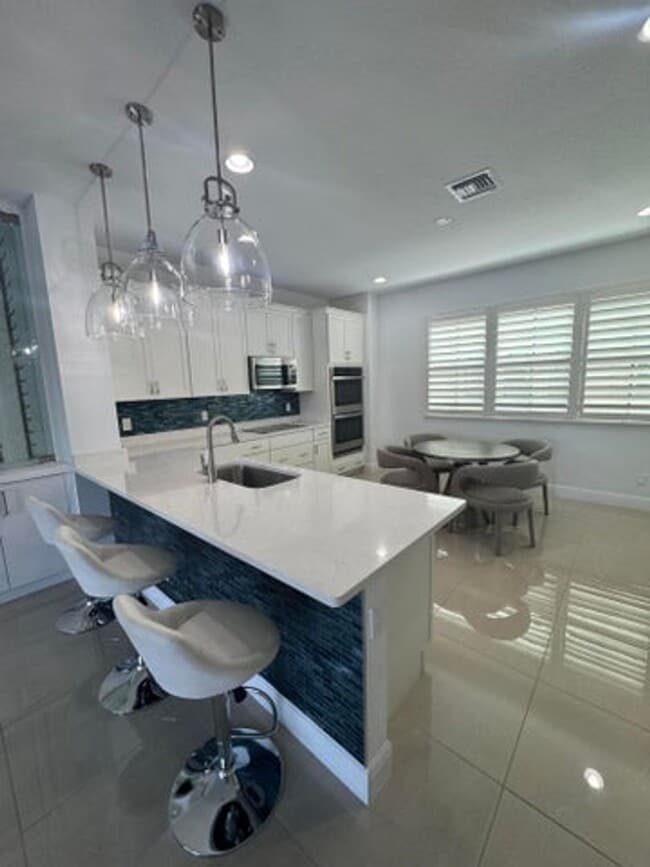 property at 613 Windward Cir N