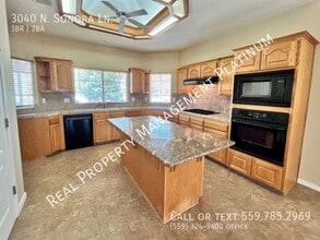 3040 N Sonora Ave in Fresno, CA - Building Photo - Building Photo