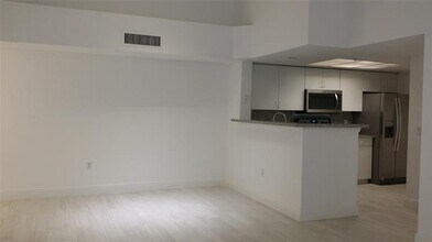 5031 Wiles Rd in Coconut Creek, FL - Building Photo - Building Photo