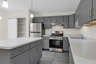 West Side Apartments in Mauston, WI - Building Photo