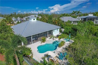 14390 Tamarac Dr in Bokeelia, FL - Building Photo - Building Photo