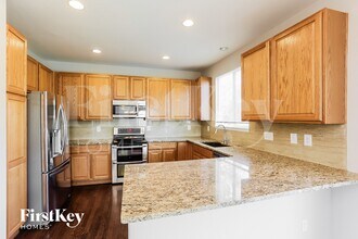 10118 Uravan St in Commerce City, CO - Building Photo - Building Photo