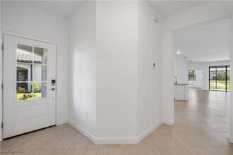 14107 Winding Cedar Wy in Miromar Lakes, FL - Building Photo - Building Photo