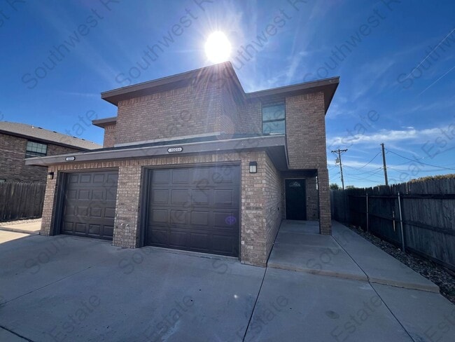 property at 1221 E 14th St