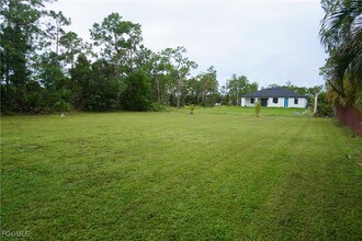 703 Grant Ave in Lehigh Acres, FL - Building Photo - Building Photo