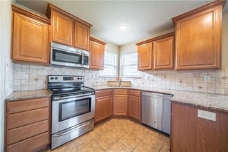 704 SW Cabriolet St in Bentonville, AR - Building Photo - Building Photo