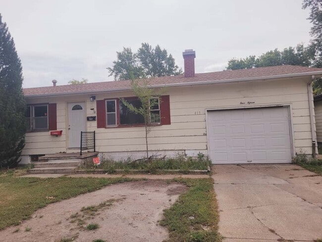 property at 415 E 12th St