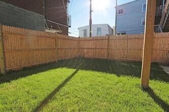 49 Lexington St, Unit #2 in Boston, MA - Foto de edificio - Building Photo