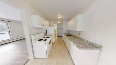 10222-10105 105 Ave in Grande Prairie, AB - Building Photo - Building Photo
