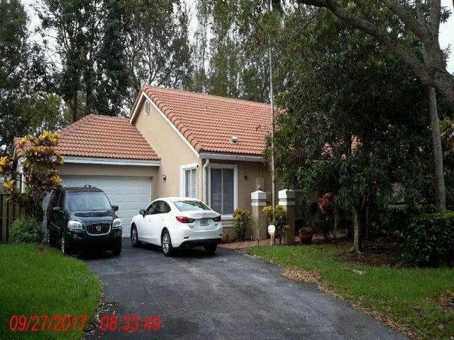 property at 10084 NW 2nd St