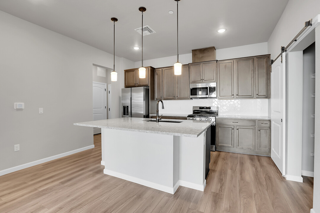 6153 N Ceylon St, Unit 2-106 in Denver, CO - Building Photo