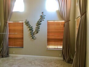 7477 NW 114th Terrace in Parkland, FL - Foto de edificio - Building Photo