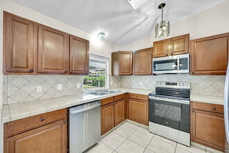 1018 Presque Isle Dr in Port Charlotte, FL - Building Photo - Building Photo