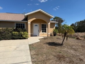 703 Jack Ave S in Lehigh Acres, FL - Building Photo - Building Photo