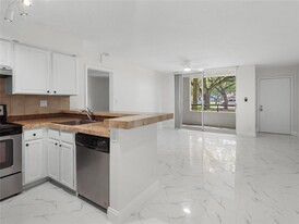 941 Lyons Rd in Coconut Creek, FL - Building Photo