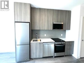 7439 Kingston Rd in Toronto, ON - Building Photo - Building Photo