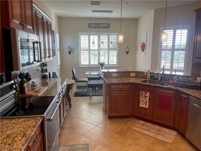 7881 Clemson St-Unit -201 in Naples, FL - Building Photo - Building Photo