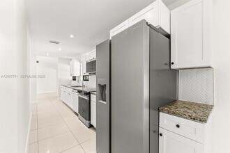 18055 Sycamore Dr W in The Acreage, FL - Building Photo - Building Photo