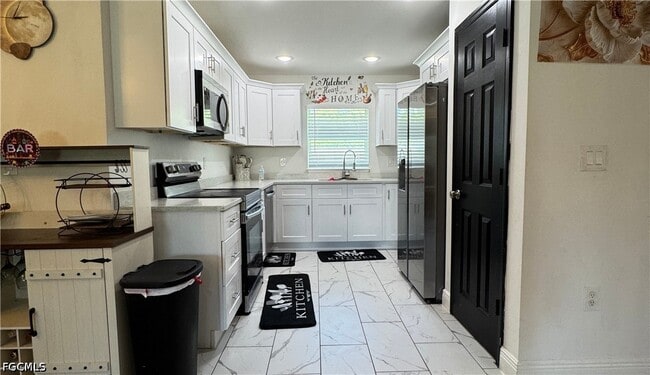 property at 303 E 7th St