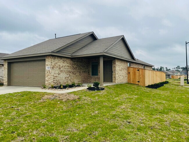 621 Roaring Fls Dr in Willis, TX - Building Photo - Building Photo