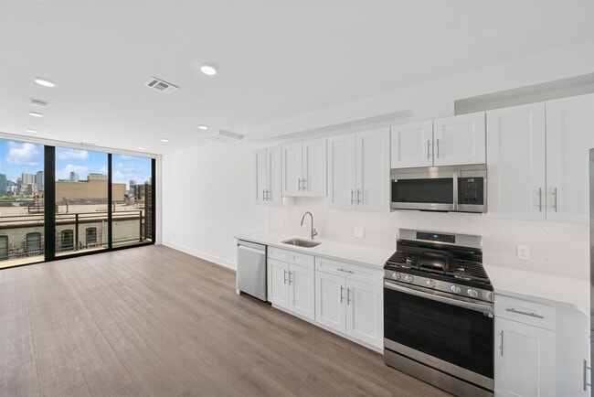 32 Jones St in Jersey City, NJ - Foto de edificio - Building Photo