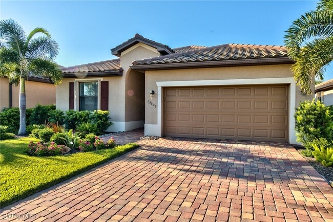 13509 San Georgio Dr in Estero, FL - Building Photo - Building Photo