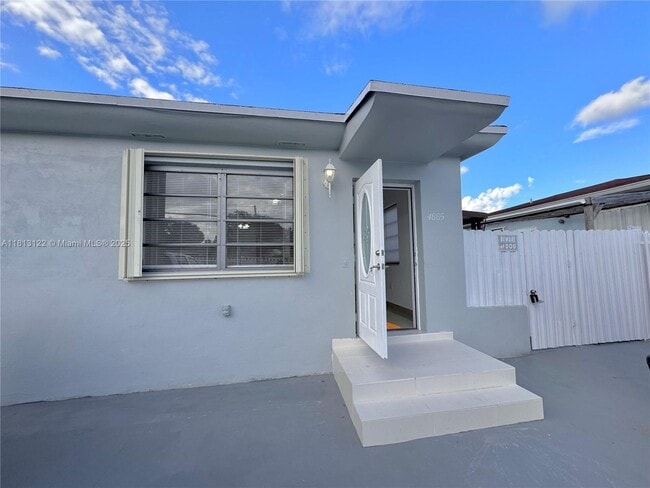 property at 4887 NW 4th St